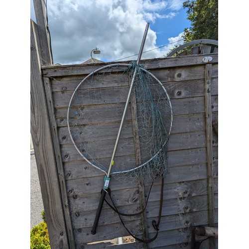 79 - Extendable landing net with leather strap.