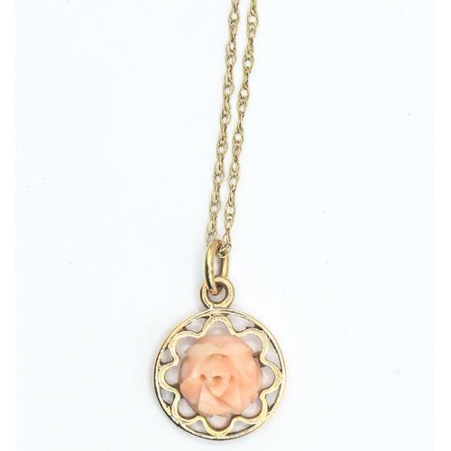 26 - Carved coral and 9ct open work gold pendant on a fine 9ct gold twist chain, length 500mm, gross weig... 