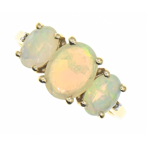 54 - 9ct gold and three stone opal ring, size P1/2, gross weight 2.55 grams