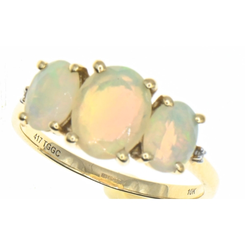 54 - 9ct gold and three stone opal ring, size P1/2, gross weight 2.55 grams