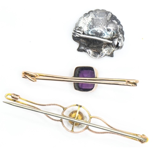 81 - Three brooches, including: an Edwardian 9ct gold and purple paste bar brooch, hallmarked Birmingham ... 