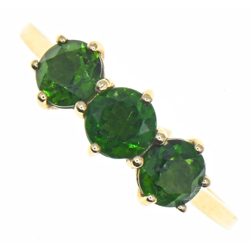 86 - 9ct gold and three green gemstone ring, size Q, gross weight 1.97 grams