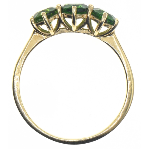 86 - 9ct gold and three green gemstone ring, size Q, gross weight 1.97 grams