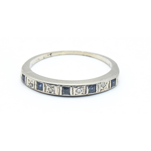 87 - 18ct white gold, diamond and sapphire half hoop ring, stamped 18ct, size M, gross weight 2.29 grams