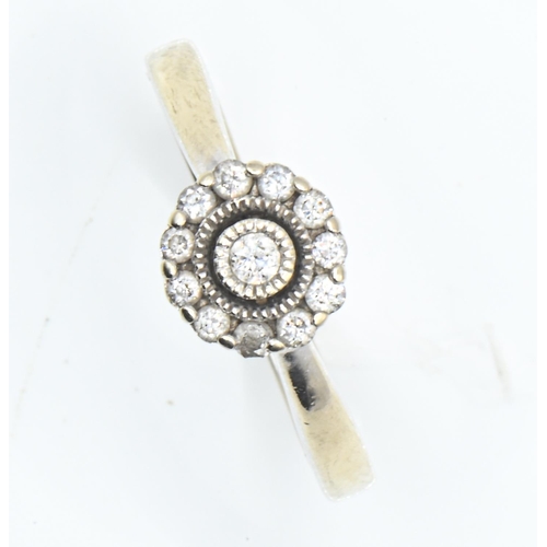 89 - 18ct white gold and diamond flowerhead cluster ring, size N1/2, gross weight 4.53 grams