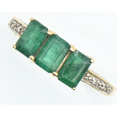 103 - 9ct gold, three stone emerald and diamond ring, size Q1/2, gross weight 2.51 grams