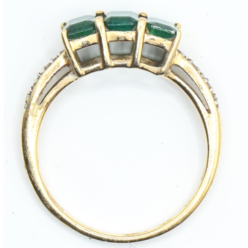 103 - 9ct gold, three stone emerald and diamond ring, size Q1/2, gross weight 2.51 grams