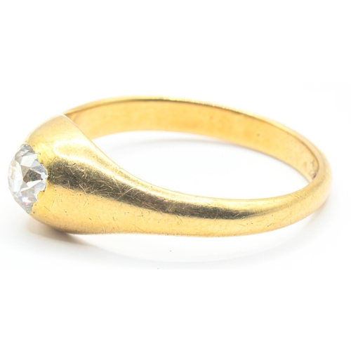 104 - 18ct gold and solitaire gypsy-set diamond ring, stamped 18ct, size W, gross weight 6.07 grams