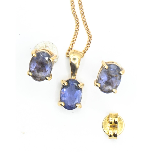 123 - 9ct gold and purple stone ear studs and pendant set, with a 9ct gold trace chain (clasp AF), gross w... 