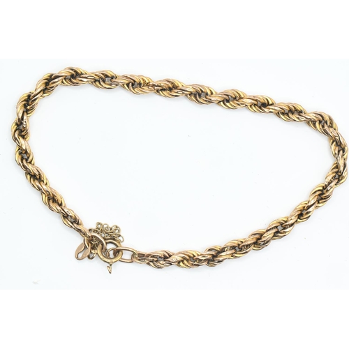 127 - 9ct gold rope twist bracelet, with safety chain, 5 grams