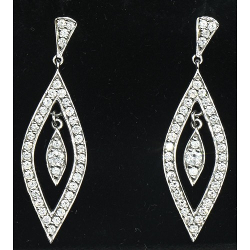 85 - Pair of 18ct white gold and diamond pendant earrings, length 34mm, gross weight 5.5 grams