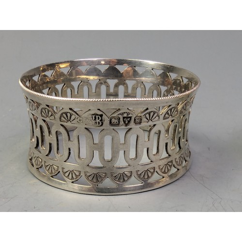 383 - Three silver napkin rings, various makers and dates, two initialled, gross weight 78.1 grams, togeth... 