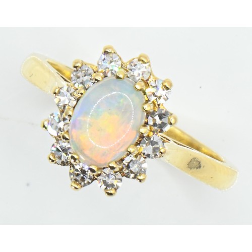 18 - 18ct gold, opal and diamond cluster ring, size L1/2, gross weight 4.1 grams