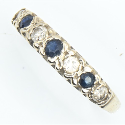 71 - 18ct gold, diamond and sapphire half hoop ring, size O, gross weight 2.7 grams