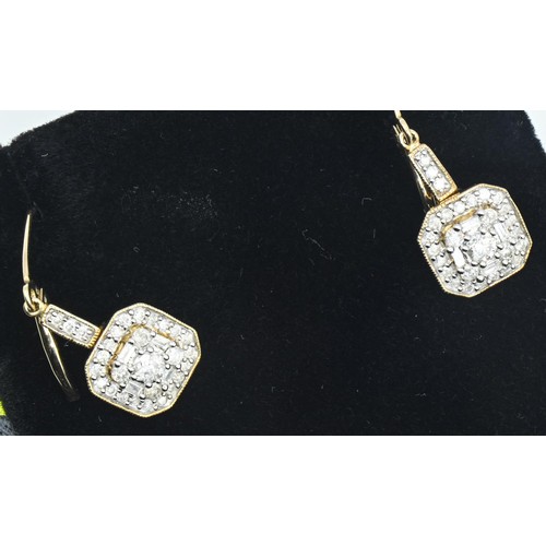 83 - Pair of 9ct gold and diamond cluster pendant earrings, length 33mm, gross weight 2.5 grams