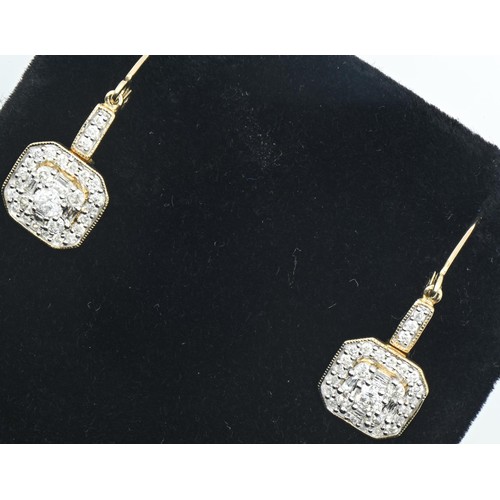 83 - Pair of 9ct gold and diamond cluster pendant earrings, length 33mm, gross weight 2.5 grams