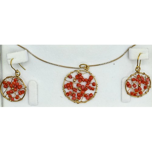 114 - 18ct gold and coral demi-parure, comprising a pendant with chain and pair of pendant earrings of web... 