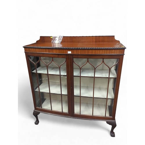 635 - Glazed-fronted 2-door display unit, with ball and claw feet, W120cm, D36cm, H134cm