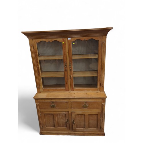 643 - Strip pine glaze-fronted dresser with 2 drawers over 2 cupboards in lower section. W127cm, D44cm, H1... 