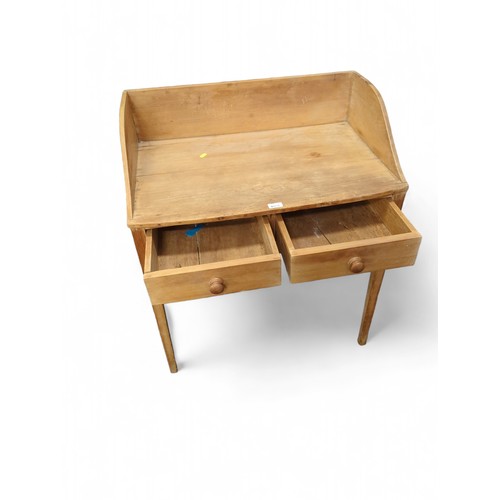 651 - Strip pine Welsh stand/wash stand with 2 drawers. W78cm,  D51cm, H91cm.