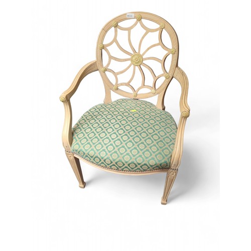 668 - Hepplewhite-style spider back carver armchair. W61cm, H85cm.