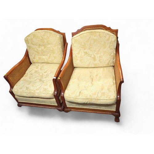 676 - Pair of wooden armchairs with rattan panels, upholstered seats and ball & claw feet. W71cm, D83c... 