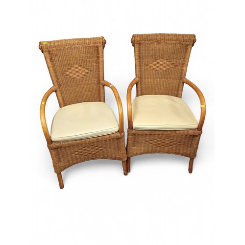 669 - Pair of Home Collection wicker and bentwood-framed armchairs by Rahaus. 