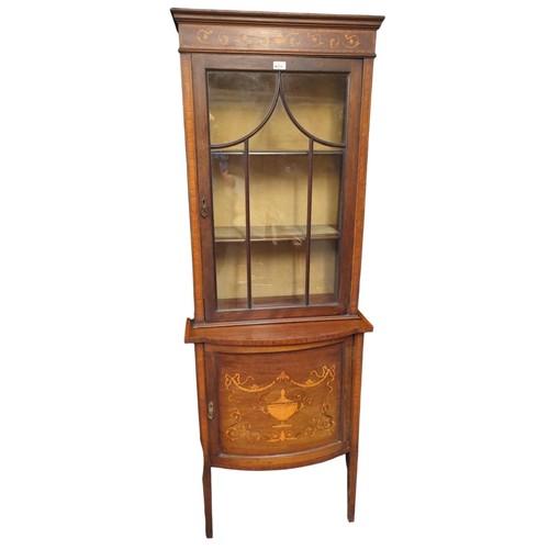 658 - Glaze-topped unit with lower cupboard. W66cm, D34cm, H185cm.