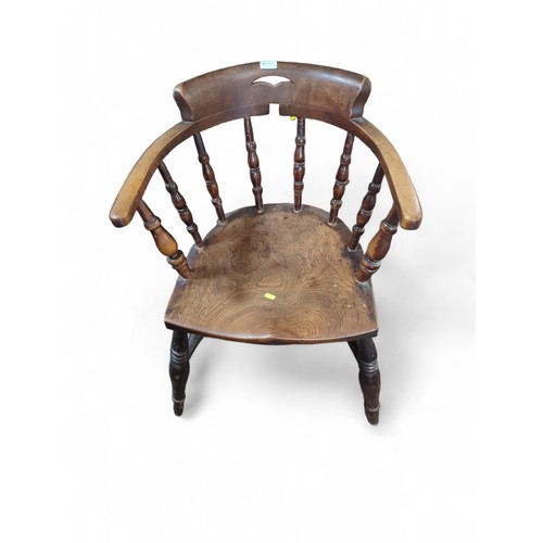 632 - Elm-seated smoker's armchair. 