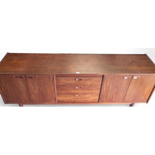 690 - Large, teak, Younger mid-century sideboard. 3 central drawers and 2 outer cupboards. L213cm, D36cm, ... 