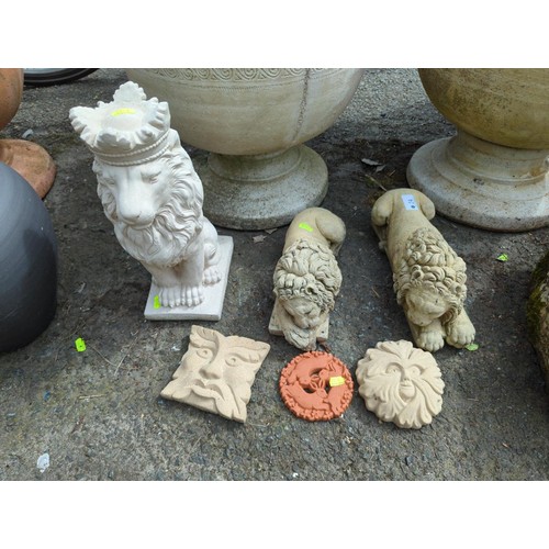 24 - 3 concrete lion ornaments (tallest H34cm), 2 greenman type concrete tiles & 3 hares terracotta t... 