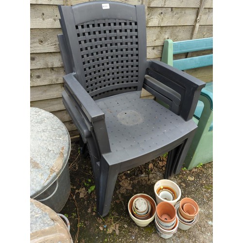 104 - 4x plastic stacking patio chairs with lattice backs