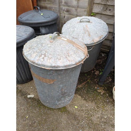 105 - 2x galvanised dustbins with lids