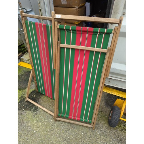 107 - 2 deck chairs with red & green striped fabric