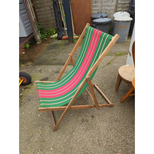 107 - 2 deck chairs with red & green striped fabric