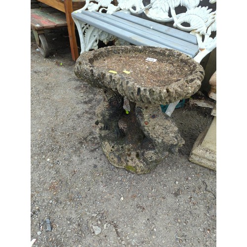 147A - Owl supported concrete bird bath. H46cm