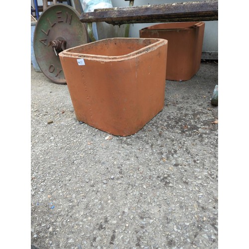 157 - 2x terracotta pipe type sections/forcers. W37cm H31cm