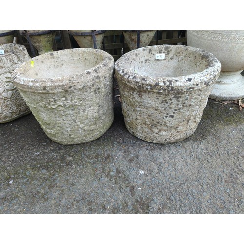 32 - Pair of concrete garden planters with swag decoration to sides. D36cm H27cm