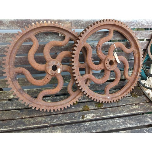 52 - Pair of large cast iron cogs/wheels. D48cm