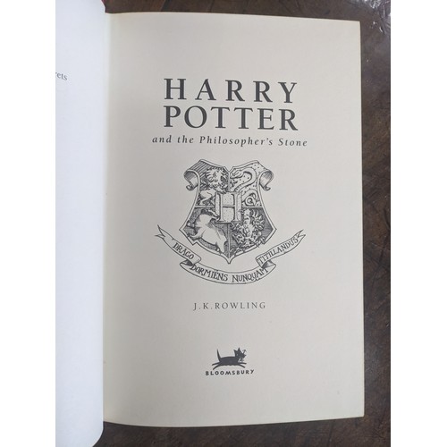 1321 - J.K. Rowling, Harry Potter seven book collection published by Bloomsbury, deluxe first editions. Bou... 