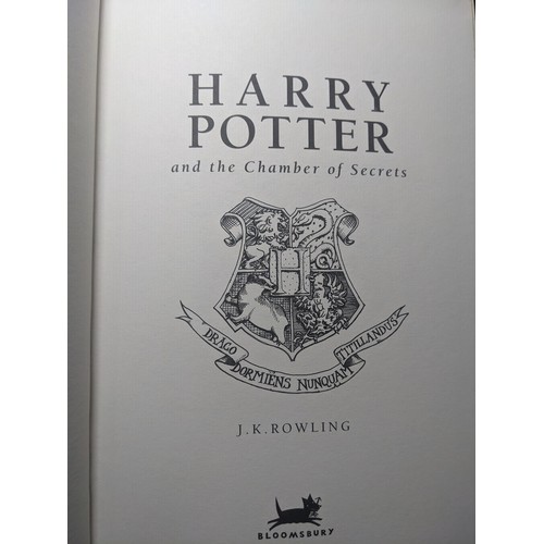 1321 - J.K. Rowling, Harry Potter seven book collection published by Bloomsbury, deluxe first editions. Bou... 