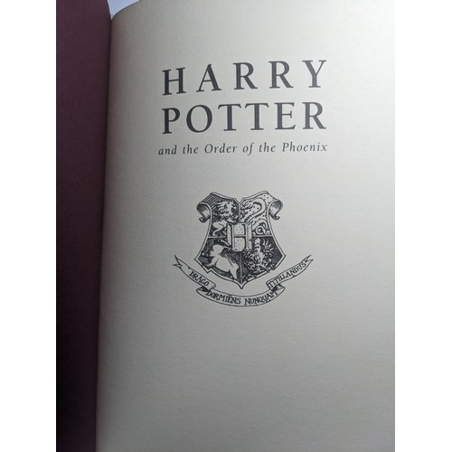 1321 - J.K. Rowling, Harry Potter seven book collection published by Bloomsbury, deluxe first editions. Bou... 