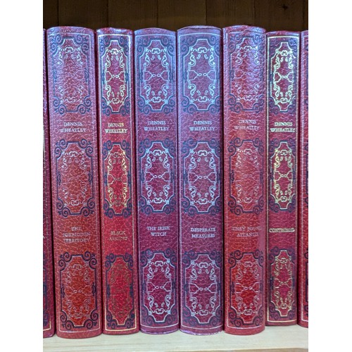 1365 - Fifty-two volumes of Dennis Wheatley novels published by Edito-Service