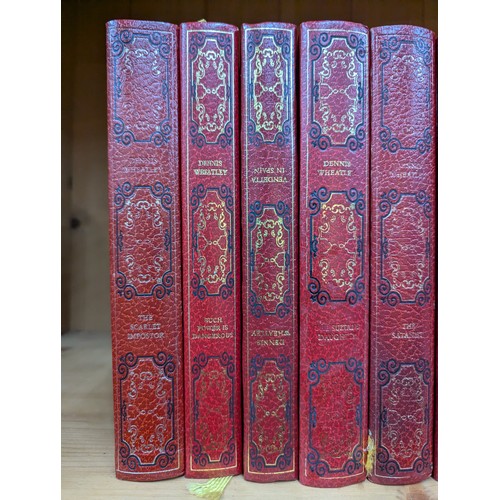 1365 - Fifty-two volumes of Dennis Wheatley novels published by Edito-Service