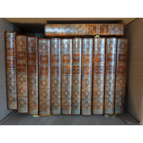 1368 - Fourteen volumes of Wilbur Smith novels, published by Edito-Service