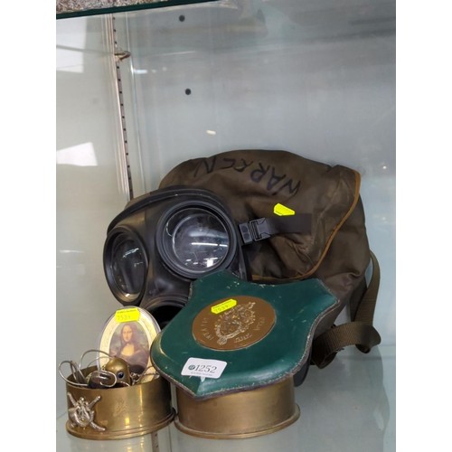 1252 - Collection of militaria inc. gas mask, trench art, regimental plaque etc.