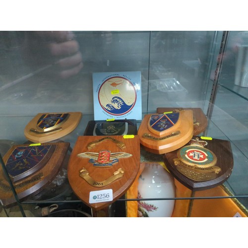 1256 - A selection of regimental plaques together with commemorative ceramic tile