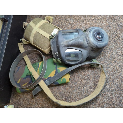 1257 - Military items inc. flask, gas mask, canvas utility bags, canteen, Winston Churchill tin etc.