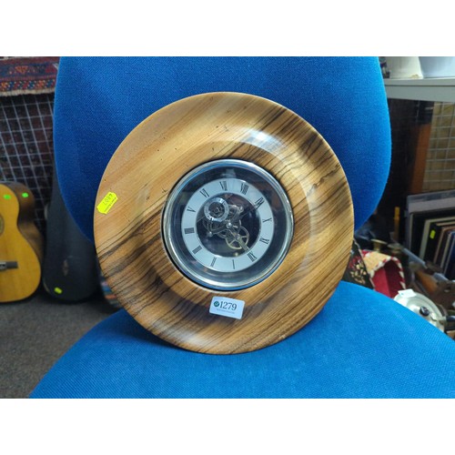 1279 - Quartz skeleton clock in wooden surround, dia. 13cm