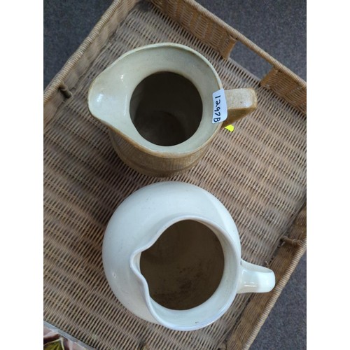 1297B - Two large ceramic jugs, tallest 24cm